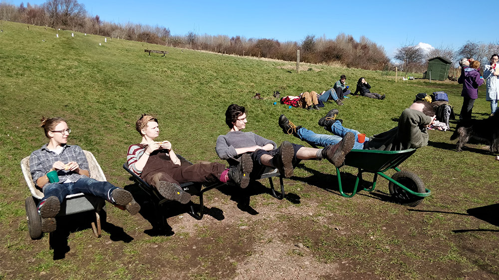 The Edinburgh Dirty Weekenders sitting in wheelbarrows